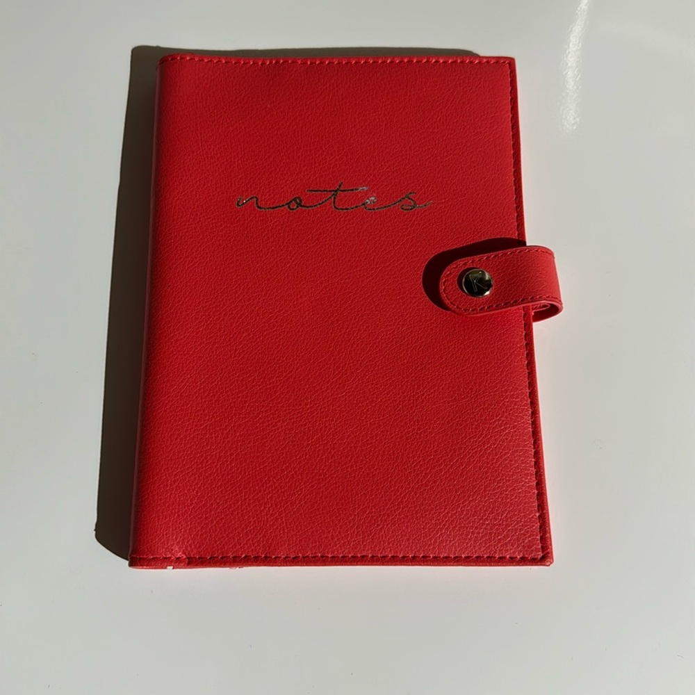 Kiki K. leather notebook holder.